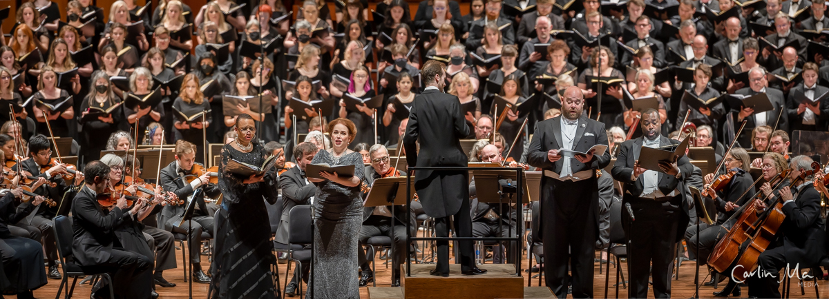 William White conducting the Harmonia Orchestra and Chorus at Benaroya Hall