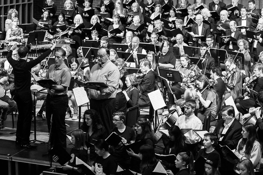 William White conducting the Harmonia Orchestra and Chorus in a dress rehearsal